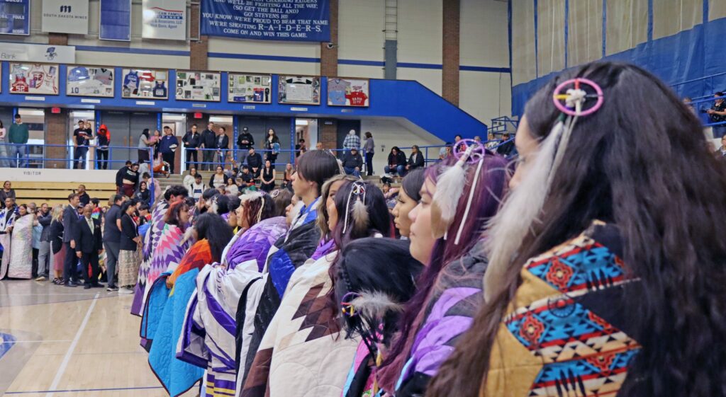 2025 Feathering Ceremony at Stevens High School where 130 Native American graduates were honored. The event was sponsored the Rapid City Area School (RCAS) Office of Indian Education. (Photo by Marnie Cook)