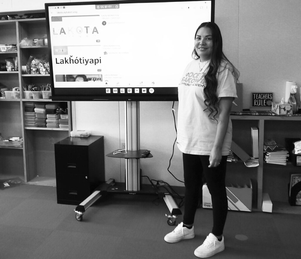 Shena now teaches at the academy. Here she is in her classroom. (Photo by Marnie Cook.)