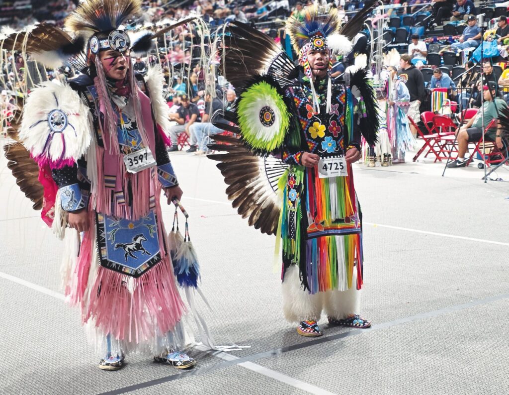 Two fancy dancers await decision.