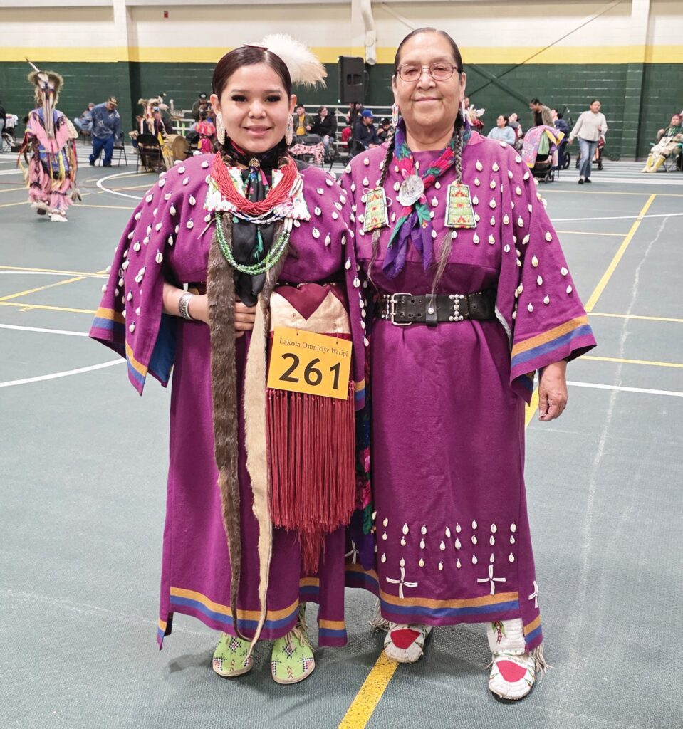 Cassandra and Sandra Iron Cloud at the 41st annual Lakota Omniciye Wacipi. (Photo by Marnie Cook)