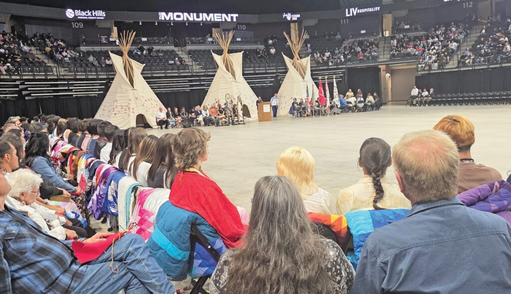 Graduates and their sponsors attending 2026 RCAS Feathering Ceremony. (Photo by Marnie Cook)
