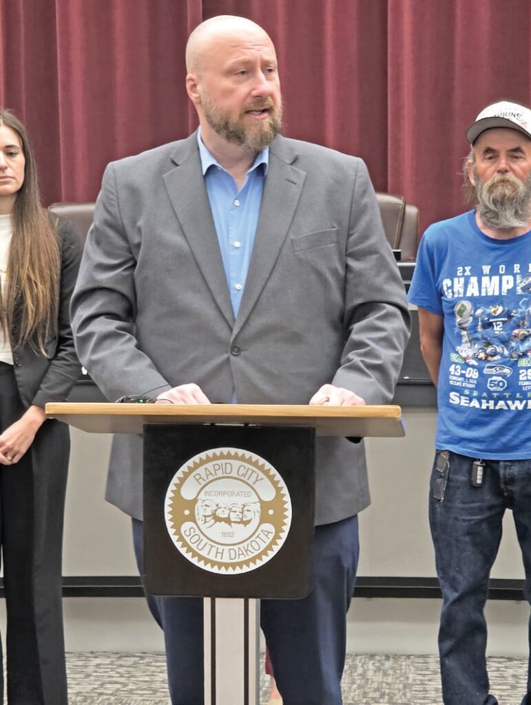 Rapid City Mayor Jason Salamun at press conference announcing garage demolition. (Photo by Marnie Cook.)
